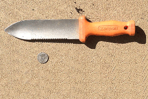 A hori-hori or Japanese gardener's knife is a very useful tool in the garden or landscape. Photo by Weston Miller, Oregon State University.  
